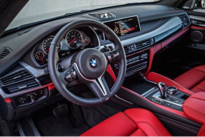 Салон BMW X5 M (на фото), как и BMW X6 M, по умолчанию отделан кожей Merino. Спортивные сиденья M с…