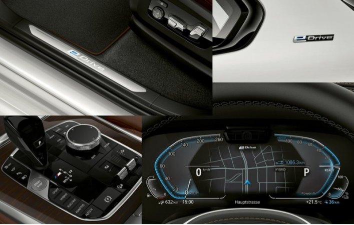 Шильдики системы BMW eDrive появились на задних стойках и порогах. На центральном тоннеле — кнопки…