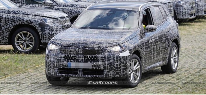 Гибридный BMW X3 2024 года показали на шпионских фото с дорожных тестов