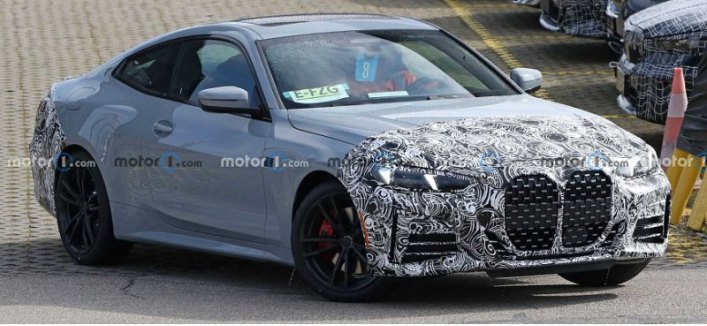 Купе BMW 4-Series 2024 года попало на шпионские фотоснимки в оттенках M Sport и M440i