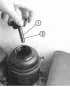 Filling with fluid and bleeding air from the hydraulic system of the power steering