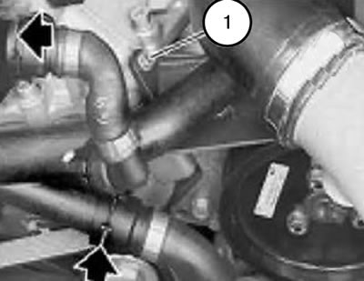 14. Вывернуть болт (1).