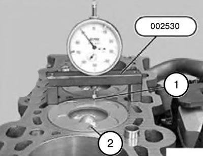 3) Очистить днища поршней в точках замера (1 и 2).