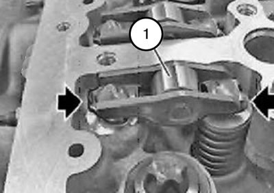 11. Проверить положение роликовых рычагов толкателей.