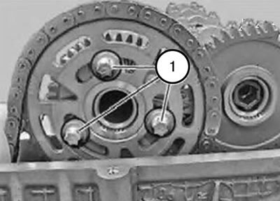 14. Надеть звездочку распределительного вала с приводной цепью на распределительный вал впускных…