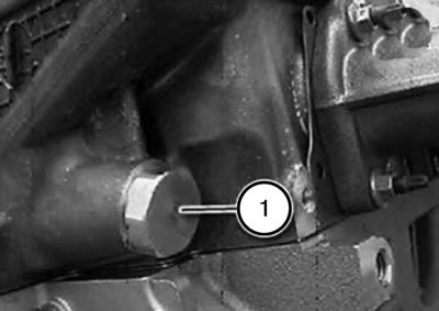18. Вставить натяжитель (1) цепи.