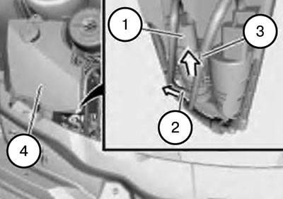 1. Unlock and disconnect the connector (1).